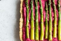 Vibrant Beet Hummus Asparagus Tart with Nutty Almond Crust
