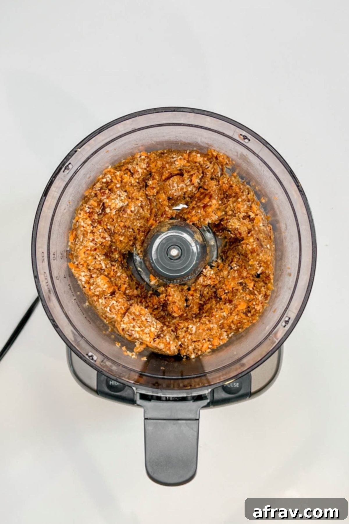 Carrot cake energy ball "dough" in a food processor.