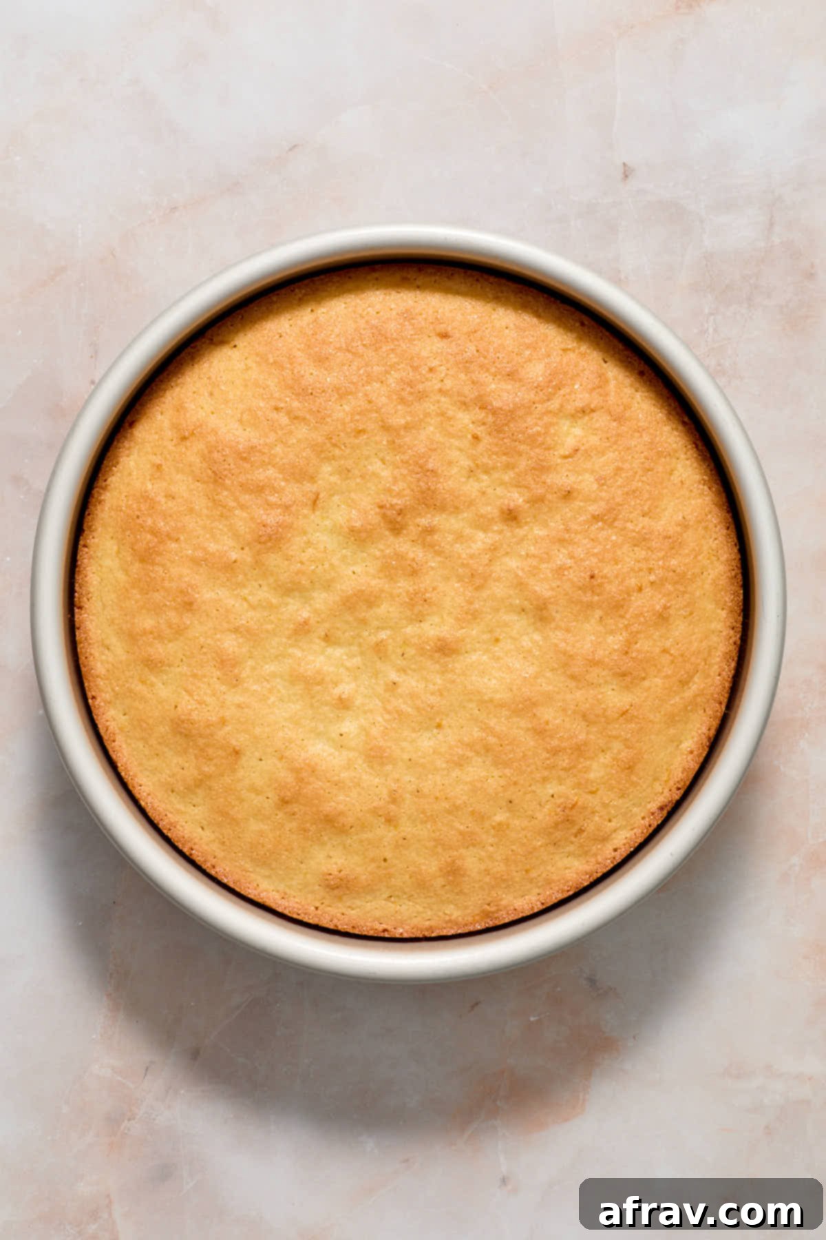 Cake baked in cake pan.