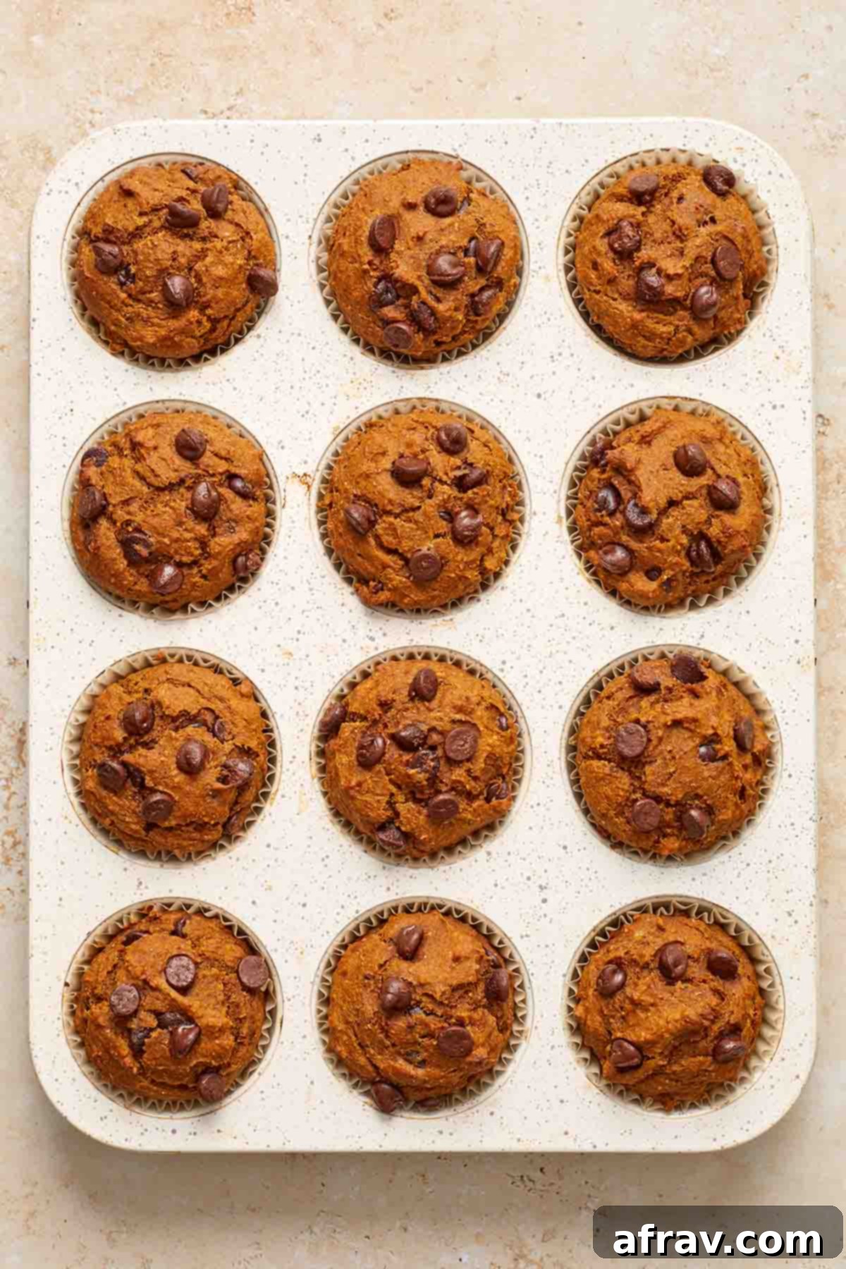 Muffins baked up in the muffin tin.