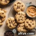 Almond flour peanut butter cookies arranged on a round wire rack.