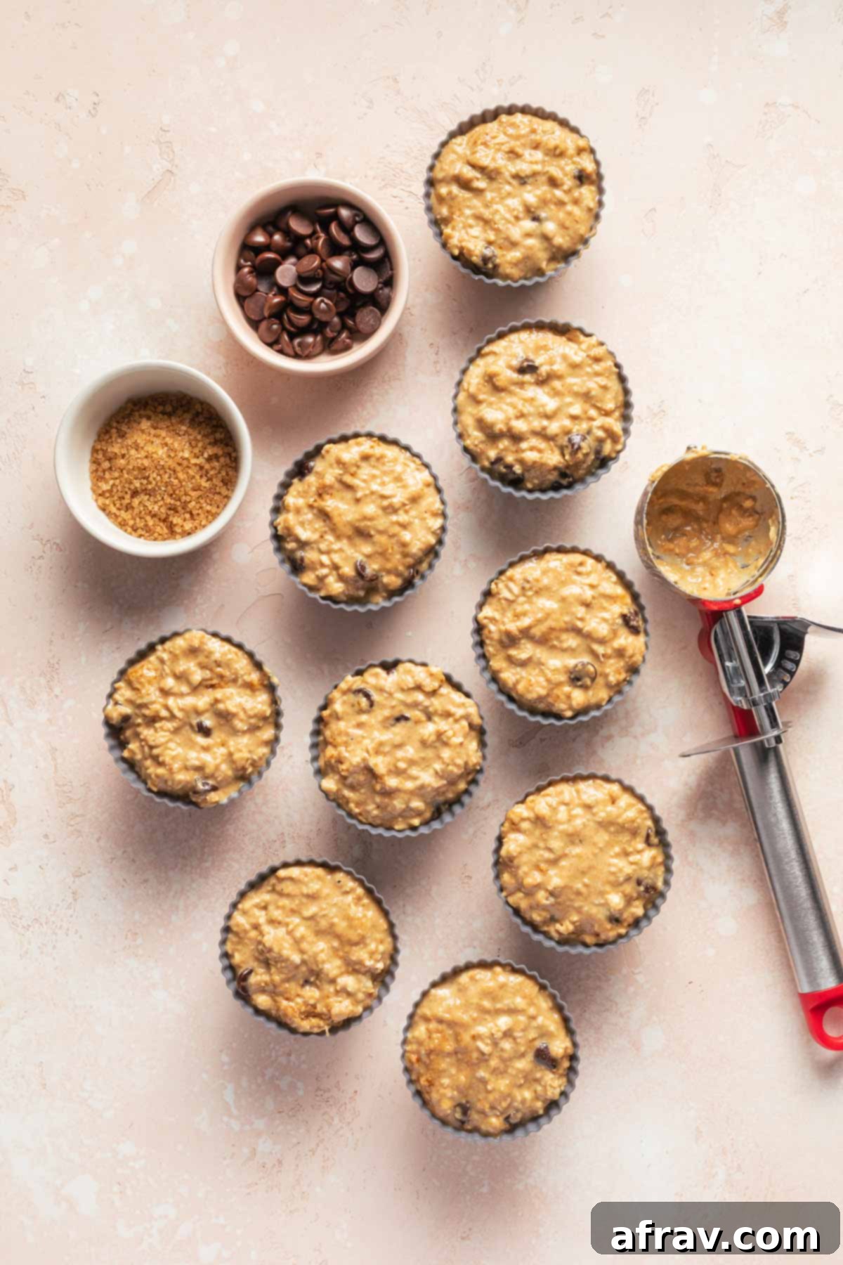 Overhead view of muffin batter in silicone muffin cups.