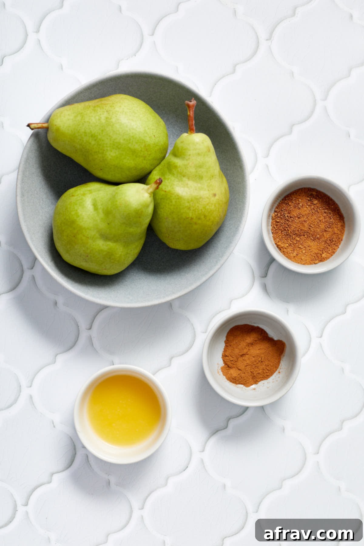Sweet Air-Fried Pears 3 Ingredients to make air fryer pears arranged in individual bowls.