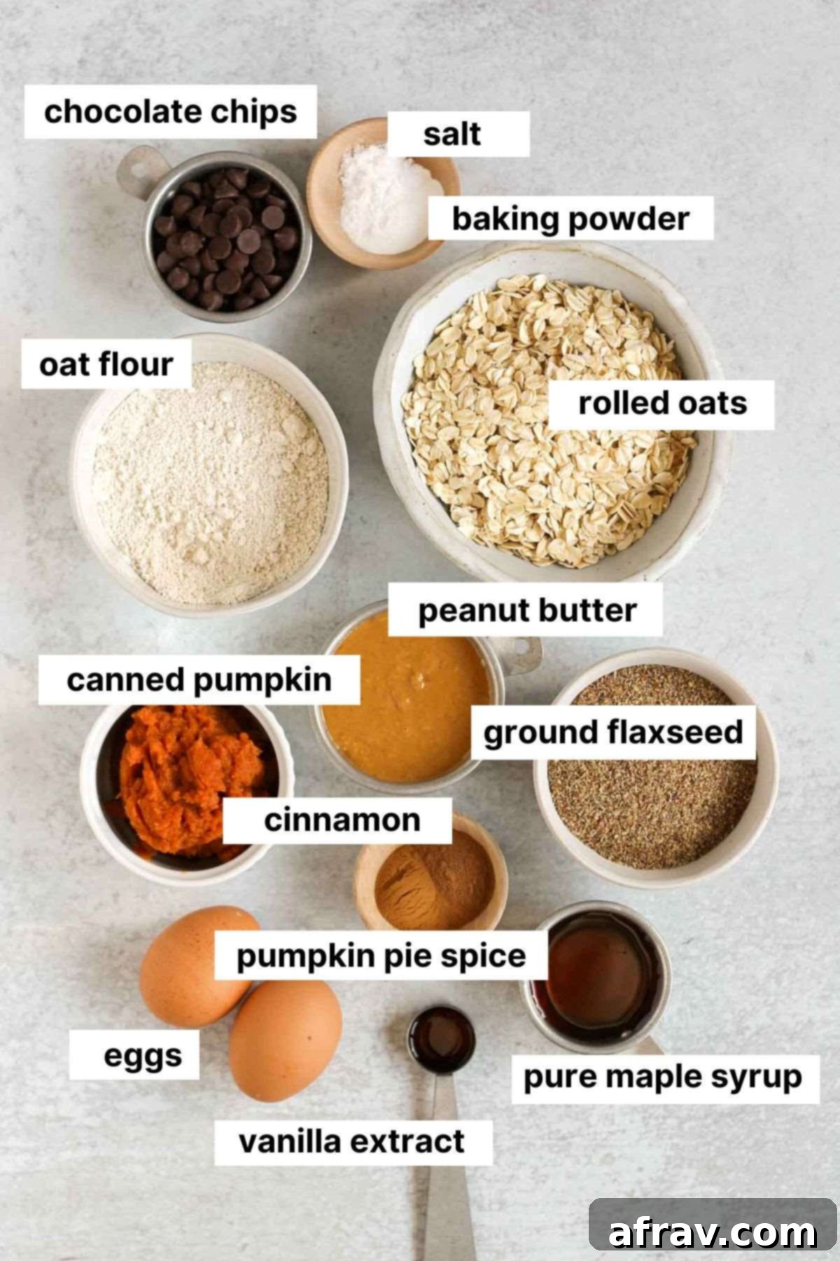 Grab-and-Go Pumpkin Breakfast Cookies 3 Labeled ingredients for pumpkin breakfast cookies laid out on a white surface.
