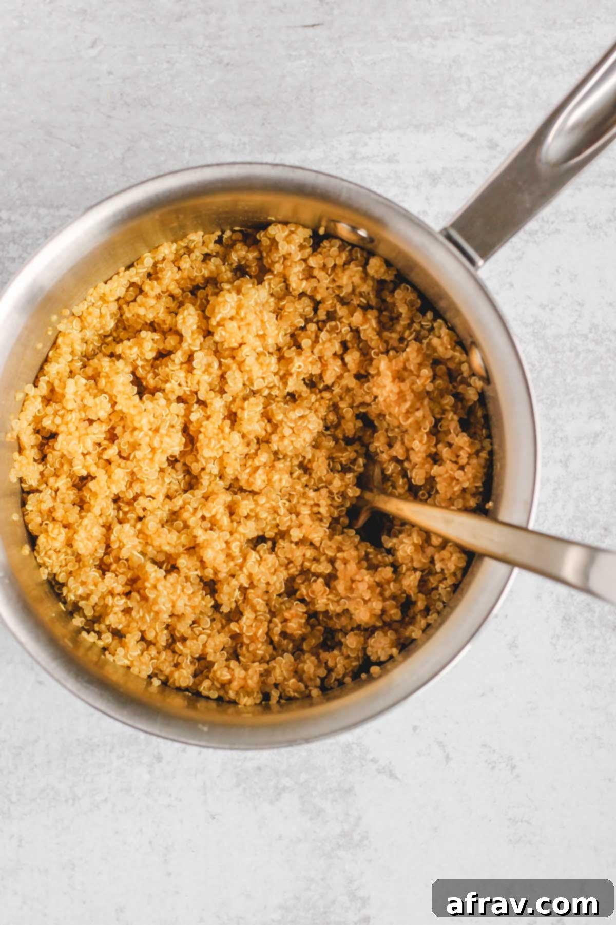 Harvest Quinoa Power Bowl 5 Cooked fluffy quinoa in a bowl.