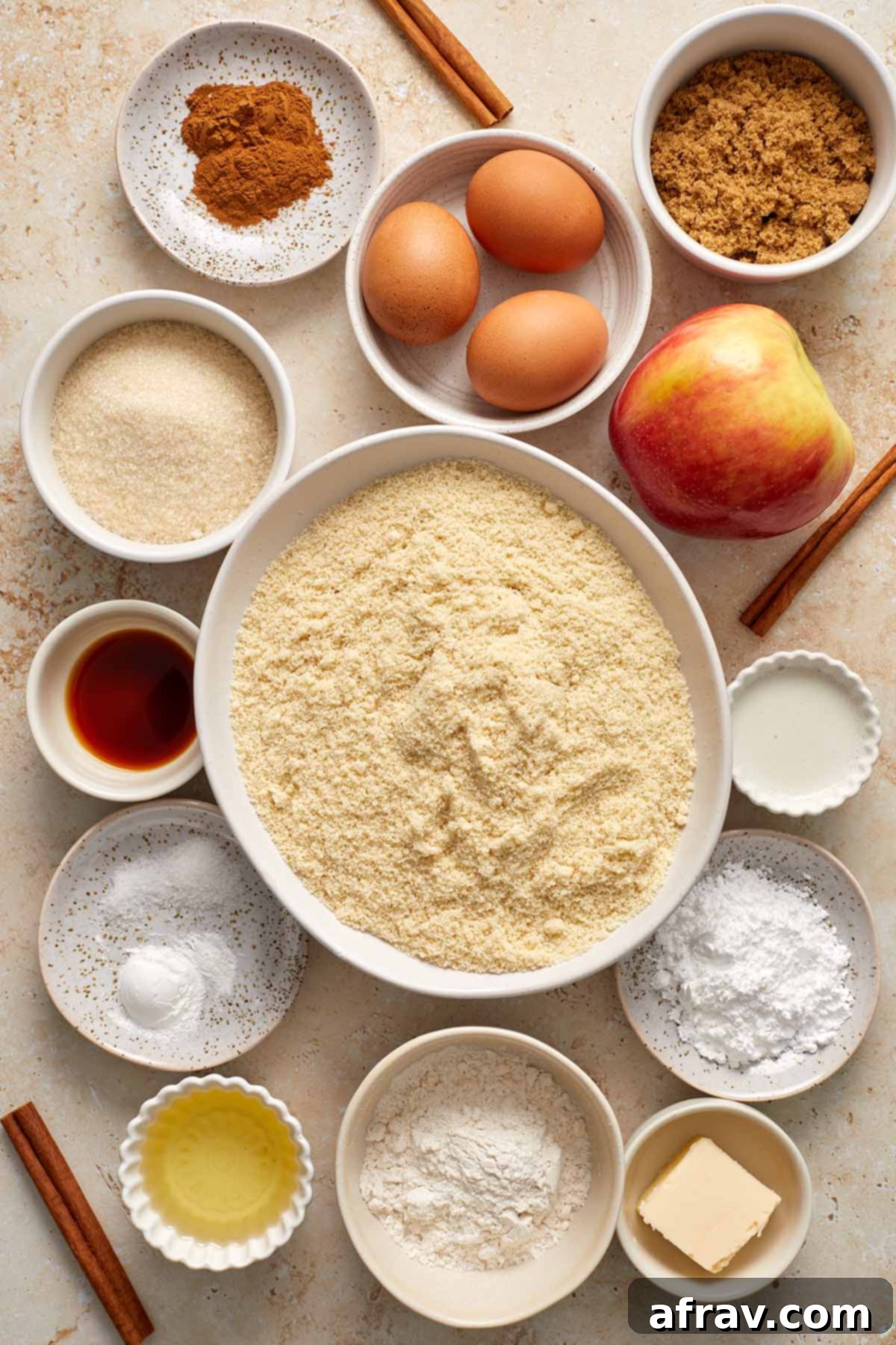 Delightful Almond Apple Cake 3 Ingredients to make almond flour apple cake arranged in individual bowls.