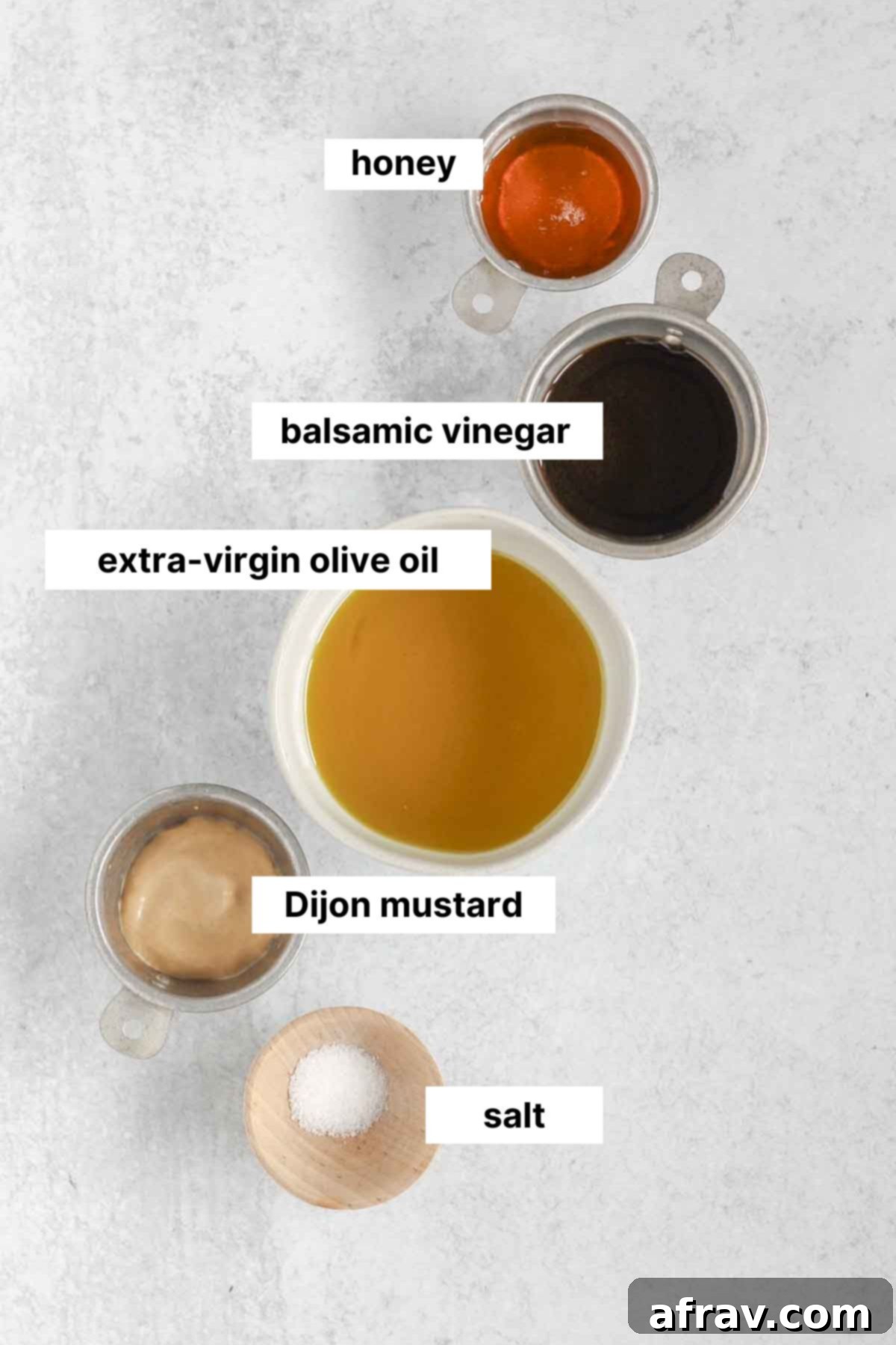 Effortless Balsamic Vinaigrette 3 Labeled ingredients for balsamic vinaigrette dressing.