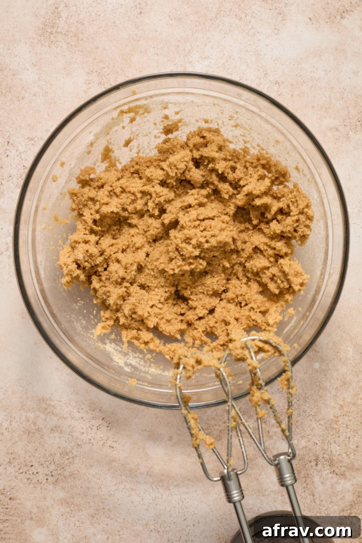 Cookie dough fully mixed together in a bowl, showing a uniform consistency.