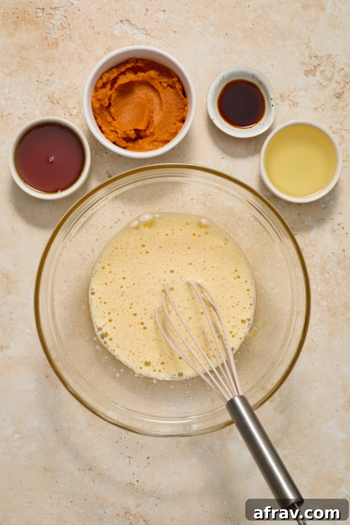 Spiced Almond Flour Pumpkin Cake 6 Room temperature eggs and granulated sugar whisked together in a large glass bowl.