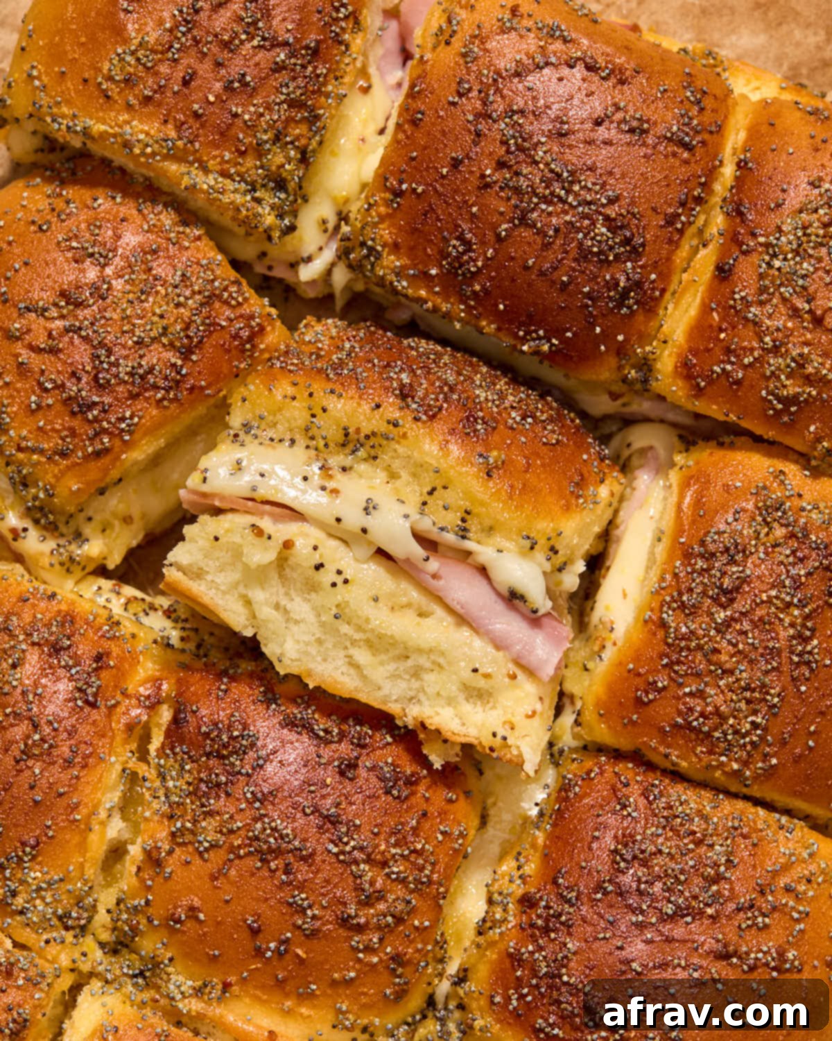 Sliders on a sheet of parchment paper with the middle slider turned on its side.