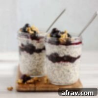 Overnight Blueberry Chia Oats 5 two mason jars filled with overnight oats with chia seeds and blueberries