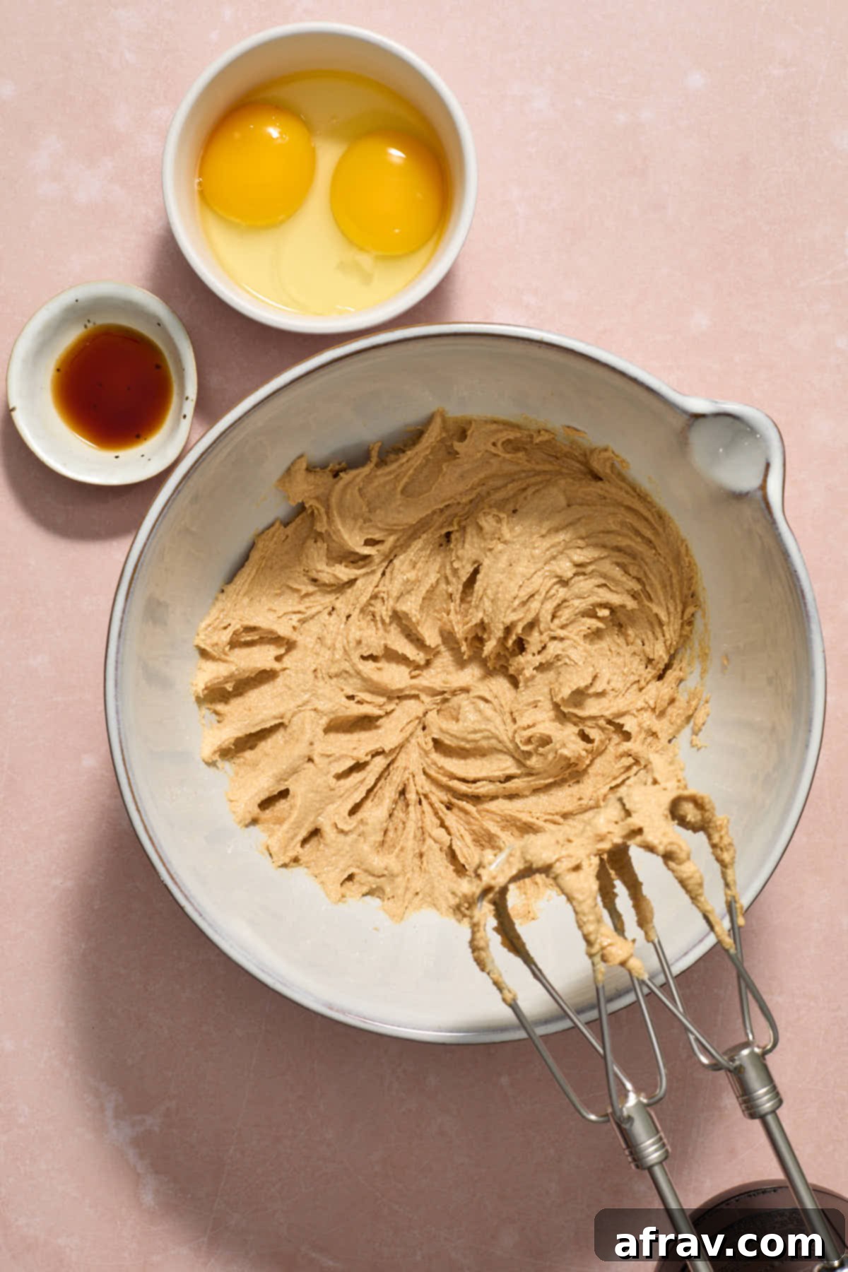 Peanut butter, butter and sugars creamed together with eggs and vanilla on the side.