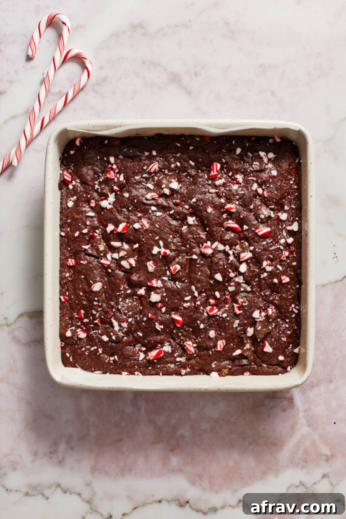 Minty Mocha Magic Brownies 9 Fully baked brownies in the pan and topped with crushed candy canes.