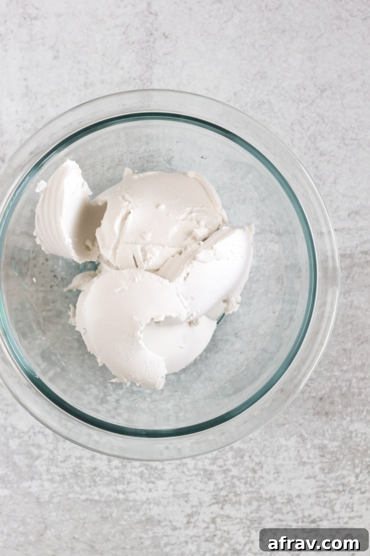 Mixing bowl with scooped coconut cream, ready for whipping.