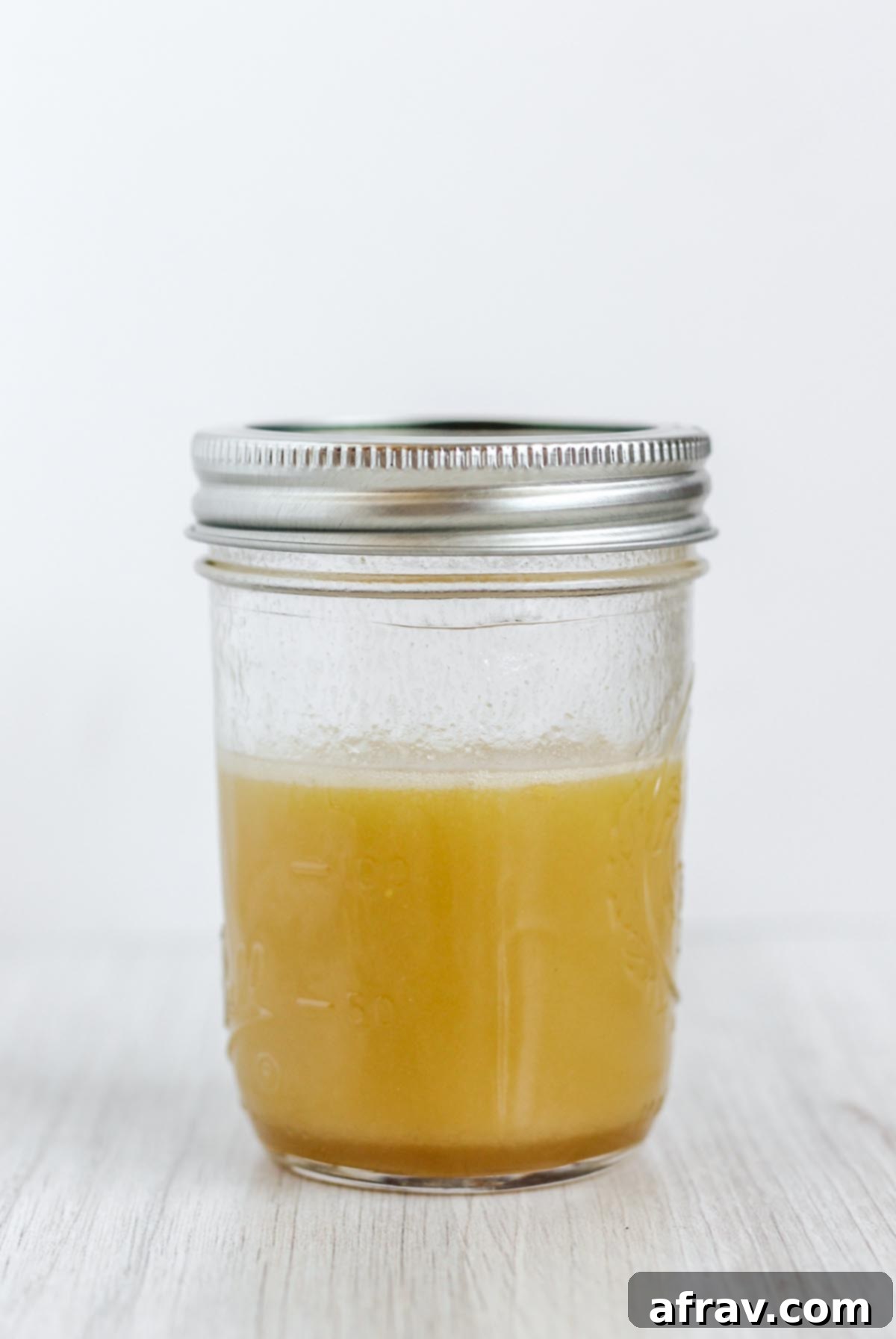 Maple vinaigrette dressing in a mason jar.