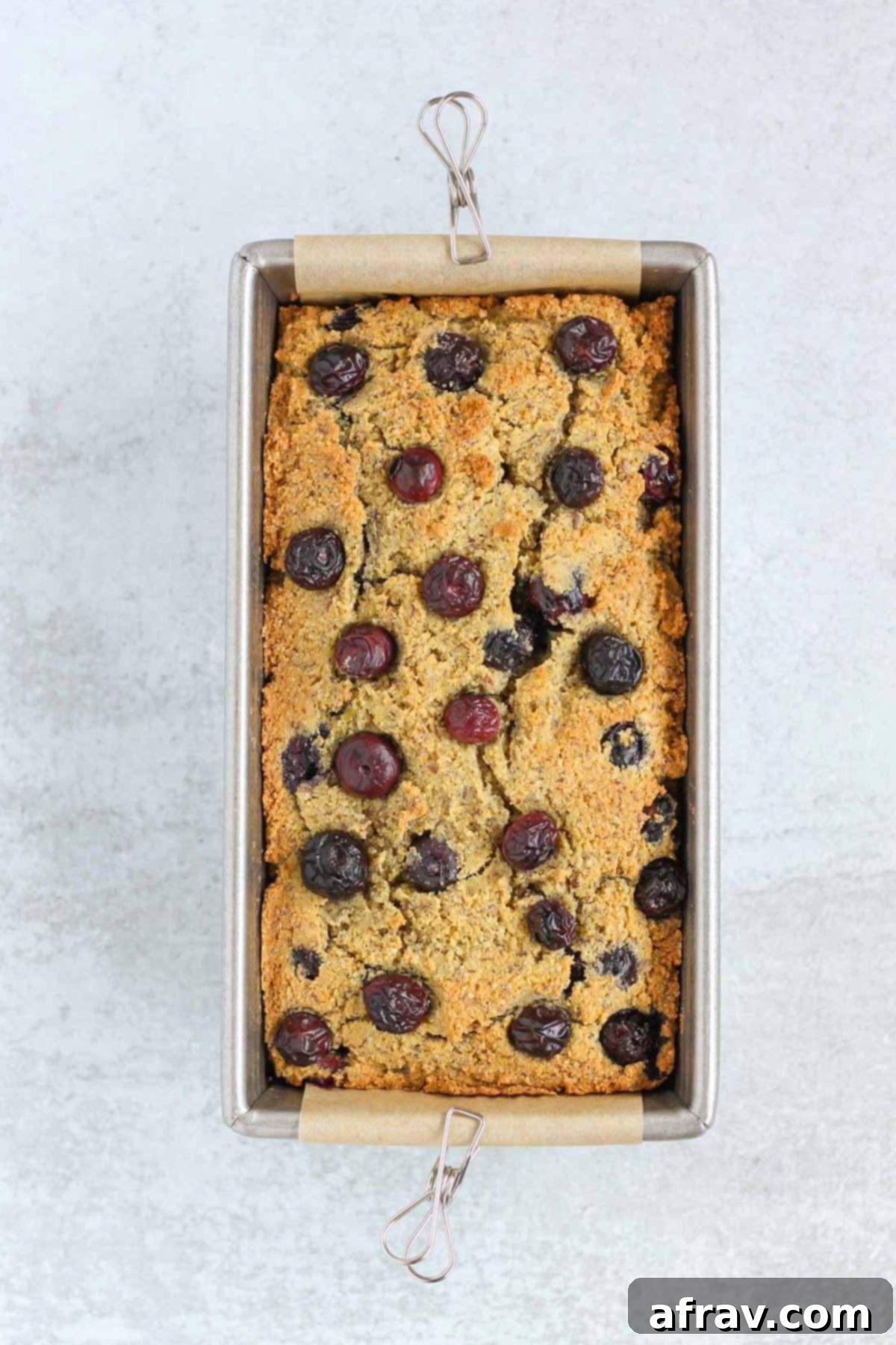 Zesty Lemon Blueberry Almond Loaf 8 Baked almond flour blueberry bread, golden brown and perfectly risen in the loaf pan.