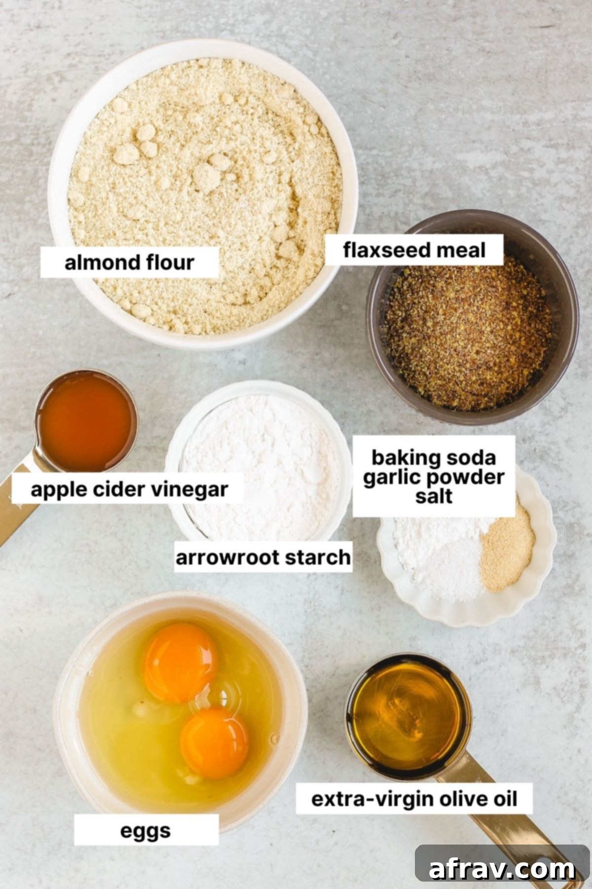 Fluffy Paleo Almond Flour Biscuits 3 Labeled ingredients used in almond flour biscuits, neatly arranged on a counter.