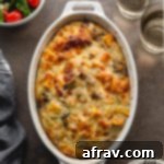 Sweet Potato Breakfast Casserole with ground turkey and eggs in a white, oval dish.