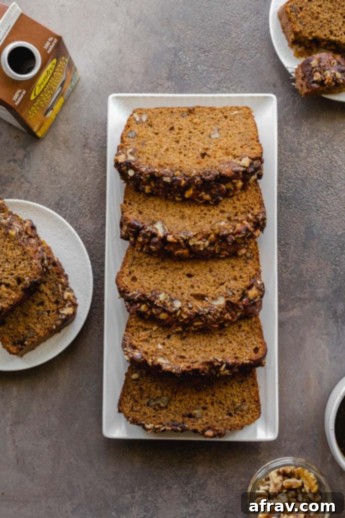 Moist Walnut Banana Bread with Molasses and a streusel topping.