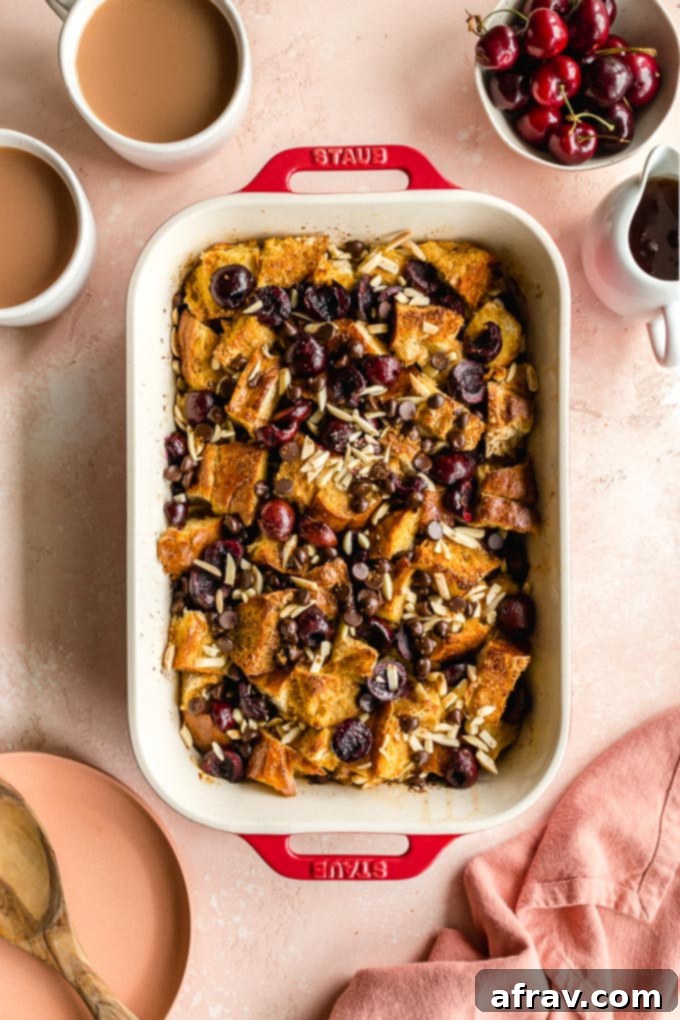 Decadent Baked French Toast Casserole with Cherries and Chocolate.