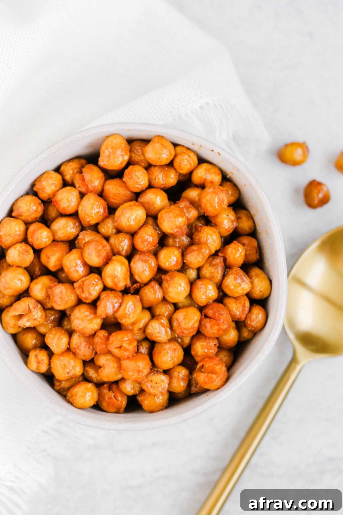 Roasted chickpeas in a white bowl.