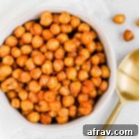 Small bowl filled with roasted chickpeas.