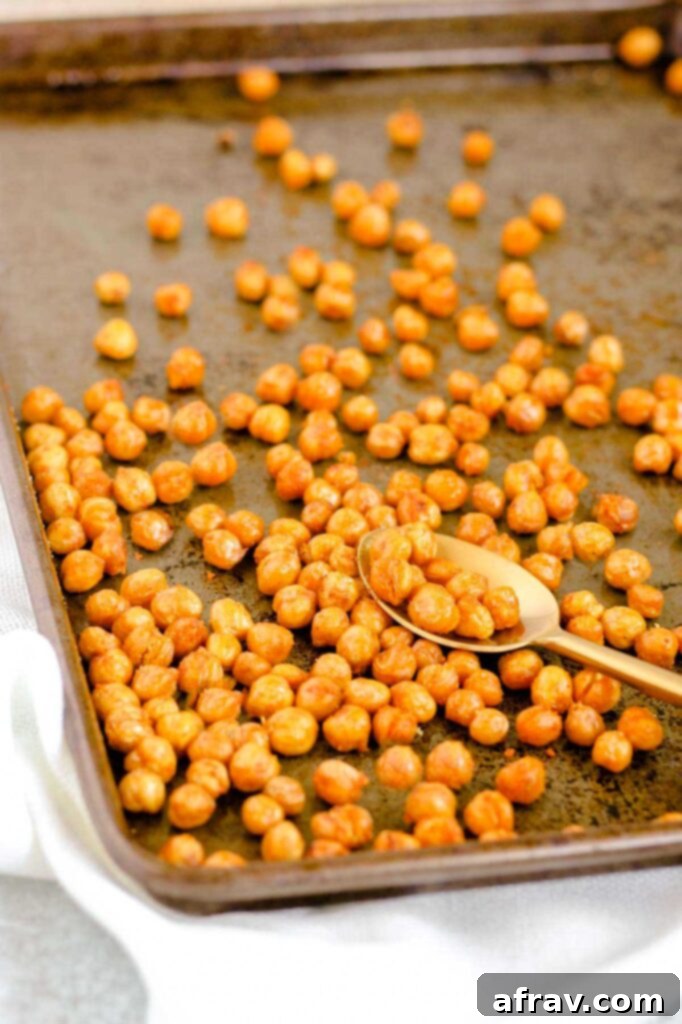 Roasted chickpeas on a baking sheet.