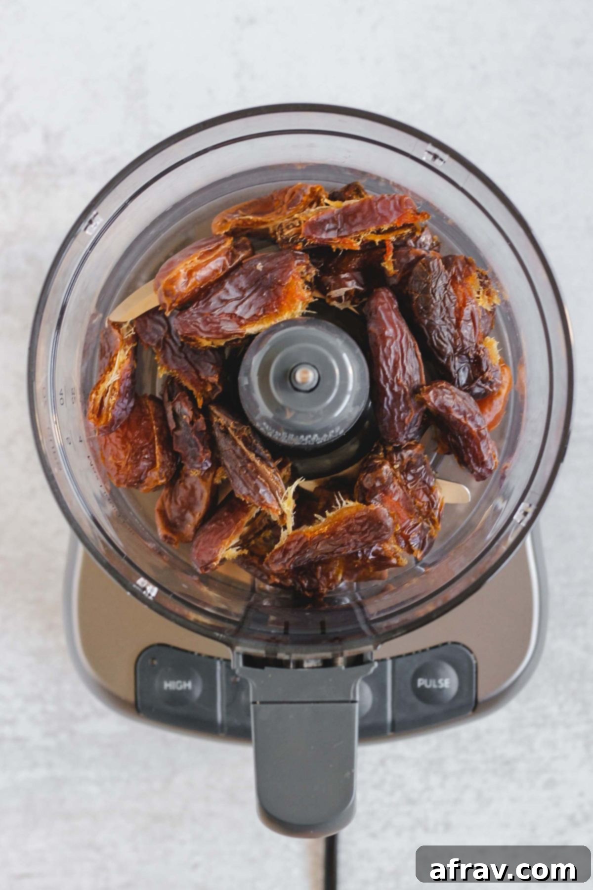 Delicious No-Bake Peanut Butter Oatmeal Bars 3 Dates in a food processor.