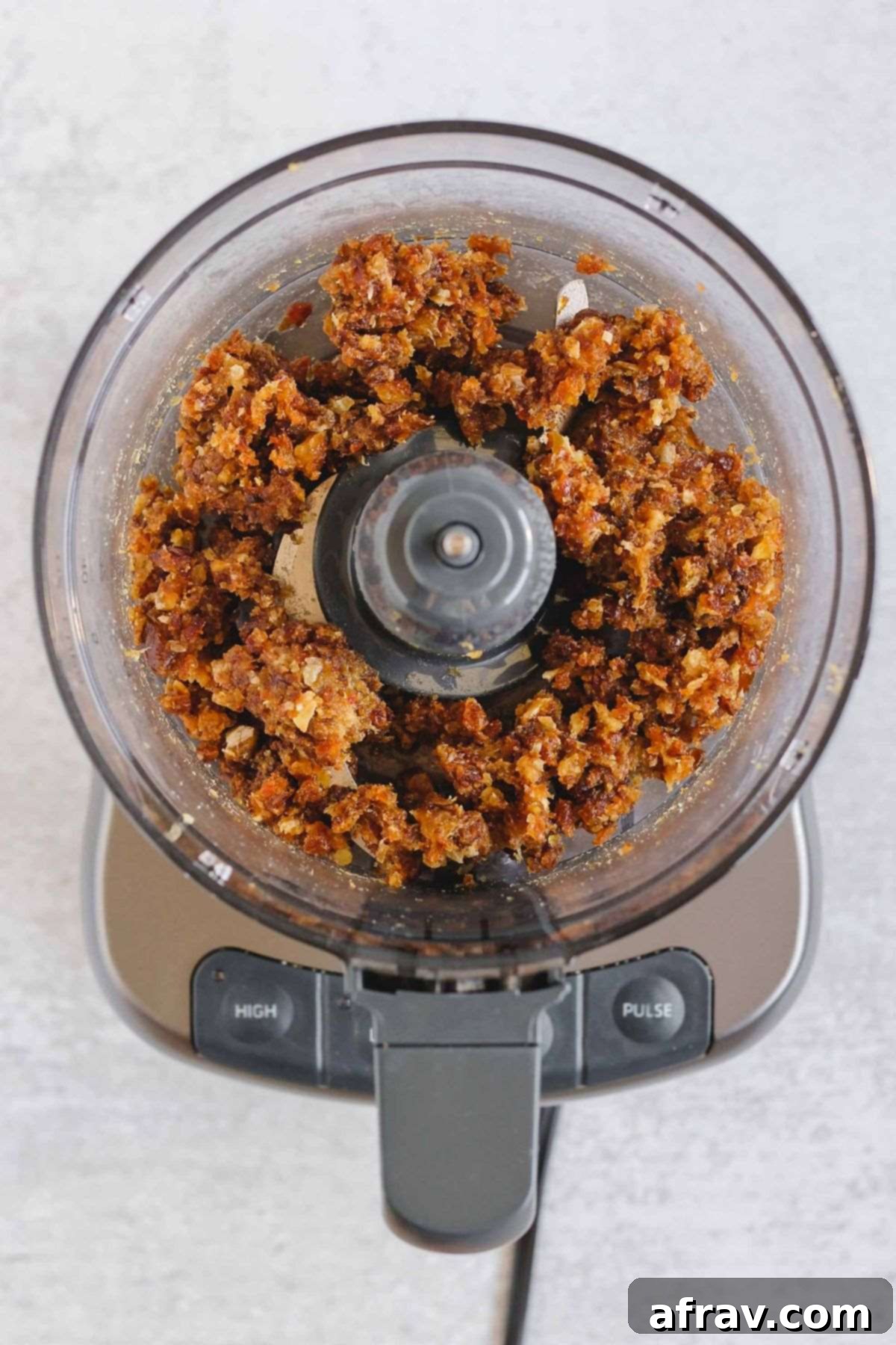 Delicious No-Bake Peanut Butter Oatmeal Bars 4 Blended dates in a food processor.