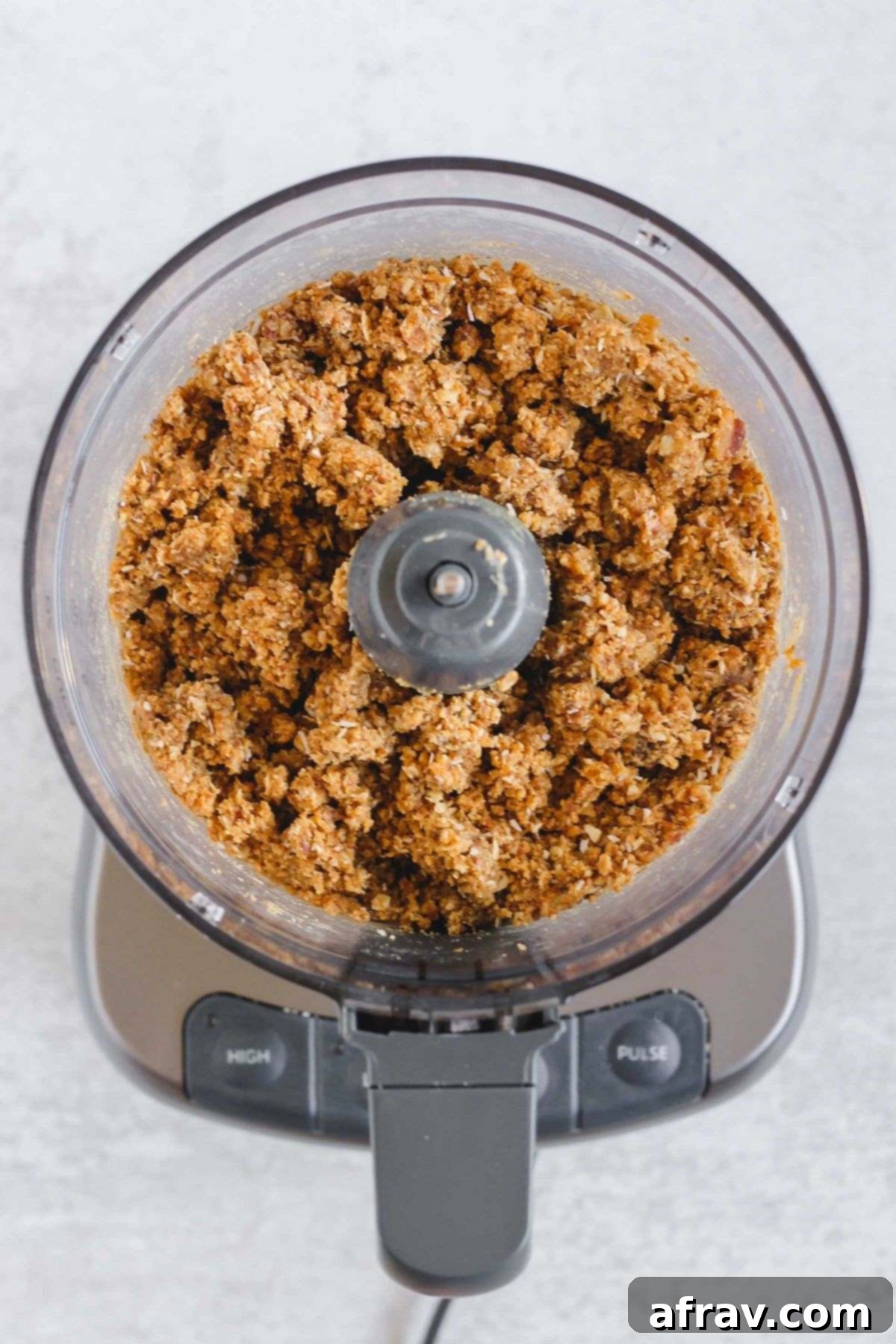 Delicious No-Bake Peanut Butter Oatmeal Bars 6 Peanut butter oat bar ingredients blended in a food processor.
