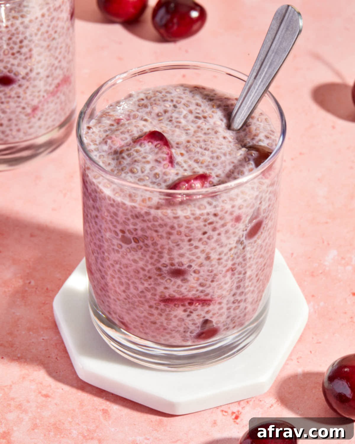 Delicious Dairy Free Gluten Free Cherry Chia Pudding 6 Close up view of chia pudding with cherry compote mixed throughout.