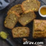 Slices of delicious grapefruit pistachio cake arranged on a wire rack for cooling.