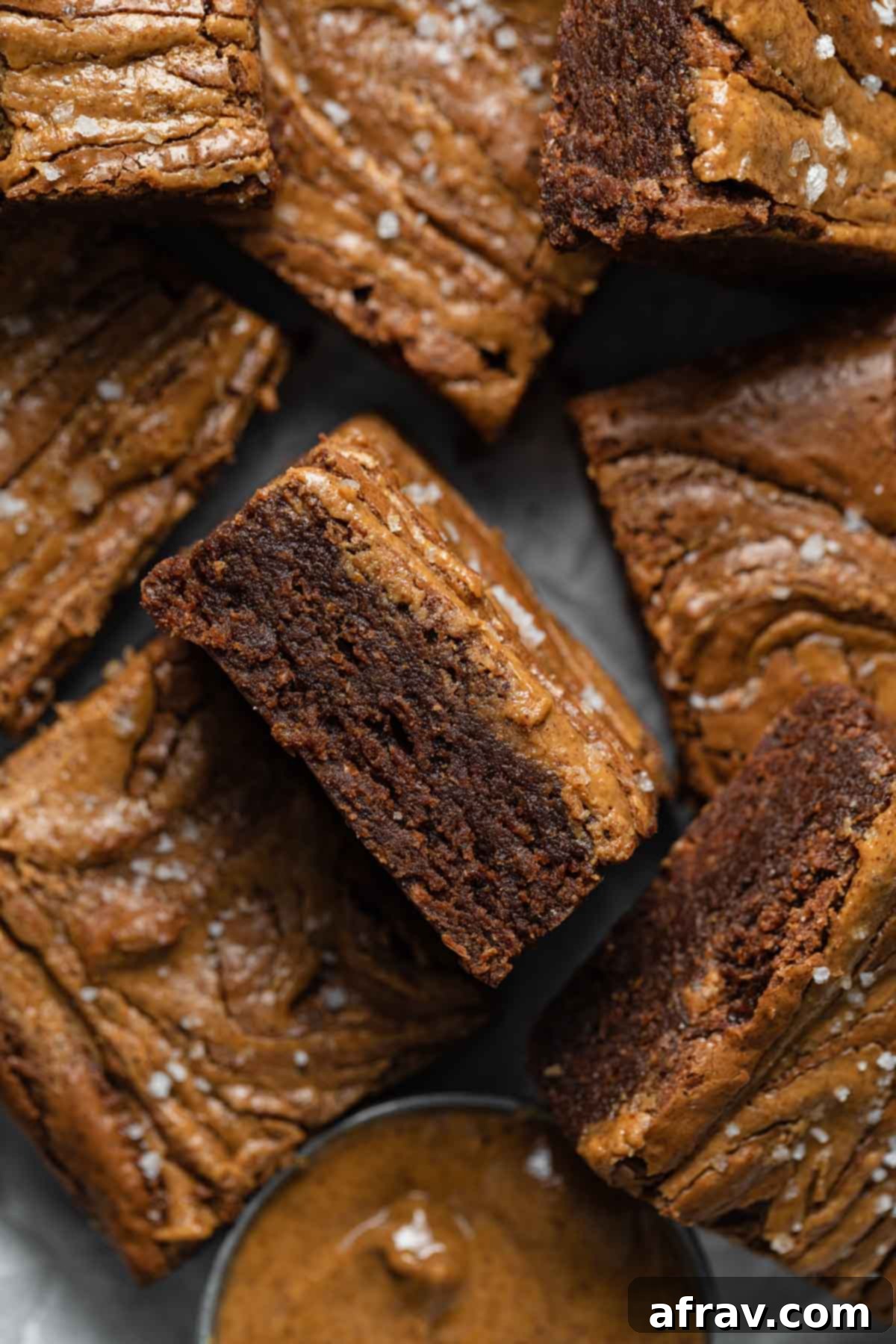 Decadent Dairy-Free Almond Butter Brownies 2 Close up of a brownie on its side to show the chewy, fudgy texture.