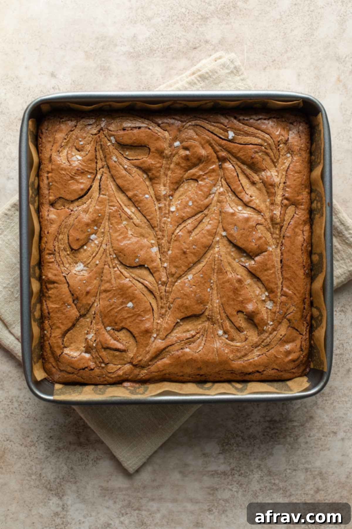 Decadent Dairy-Free Almond Butter Brownies 8 Almond butter brownies baked up in a square pan.