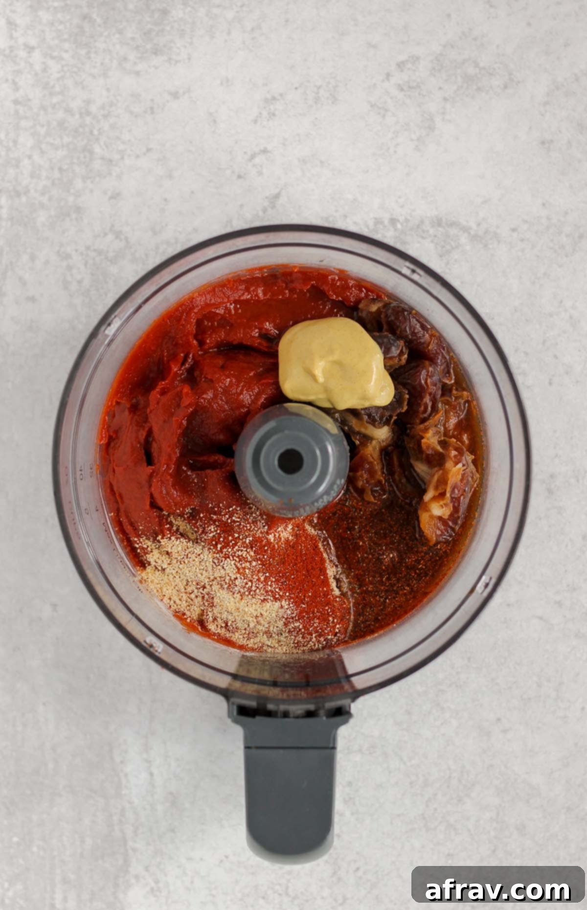 Delicious Whole30 Paleo BBQ Sauce 3 Ingredients for Whole30 BBQ sauce in a food processor, ready to blend.