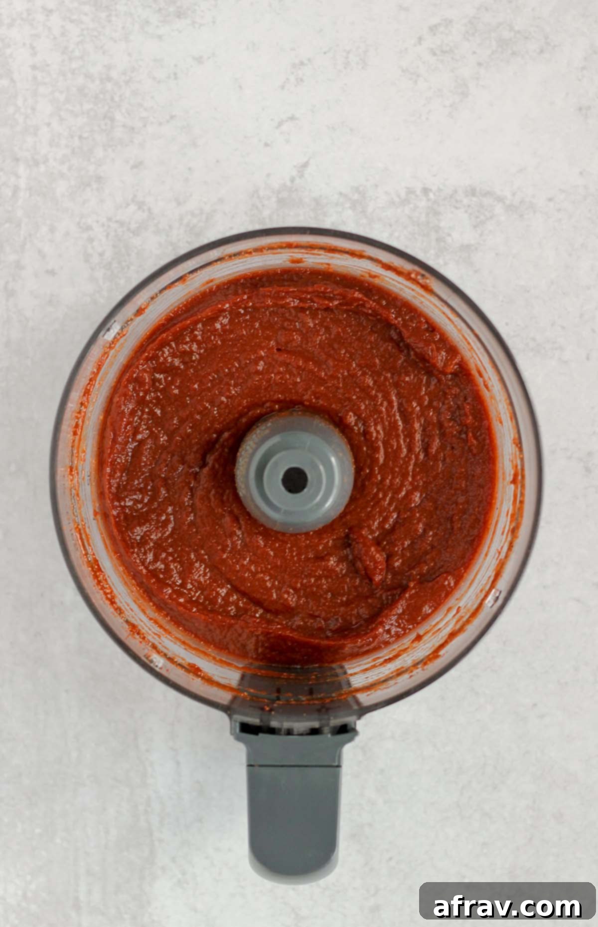 Delicious Whole30 Paleo BBQ Sauce 4 Smooth Whole30 BBQ sauce blending in a food processor.