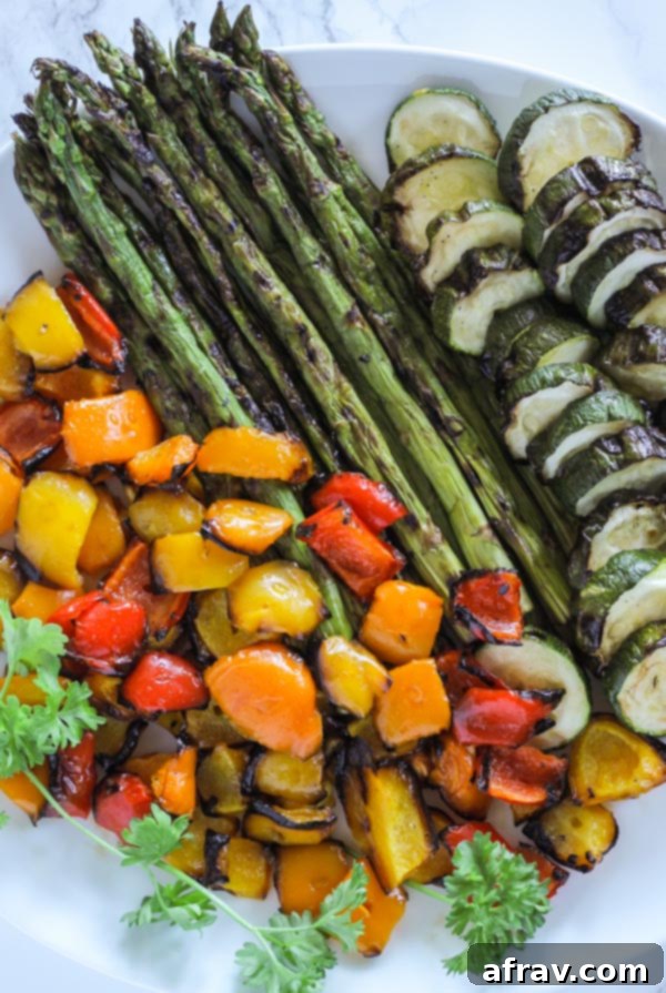 plate with grilled asparagus, grilled zucchini, and grilled peppers