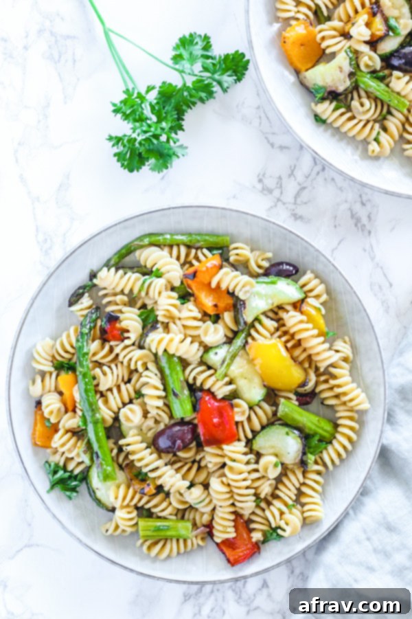 grilled vegetable pasta salad in single serve round plate