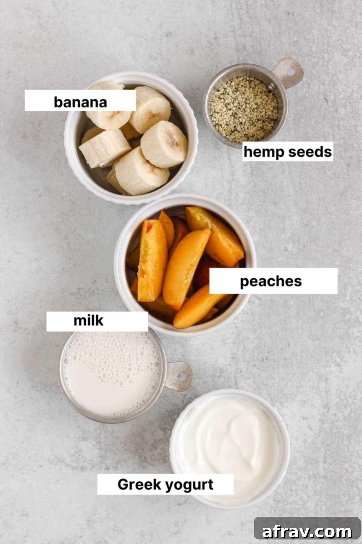Labeled ingredients for a peach banana smoothie.