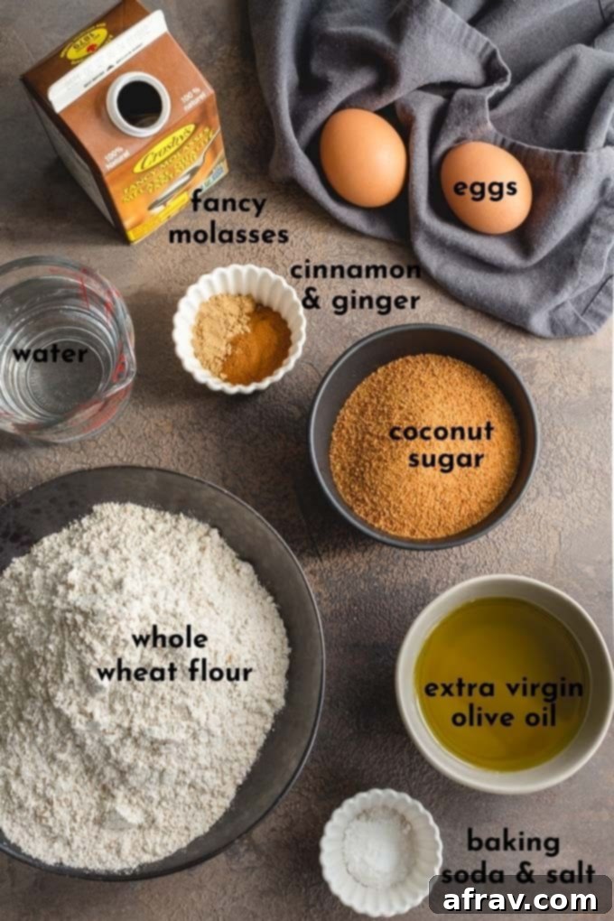 Overhead view of individually arranged ingredients for the easy gingerbread cake recipe.