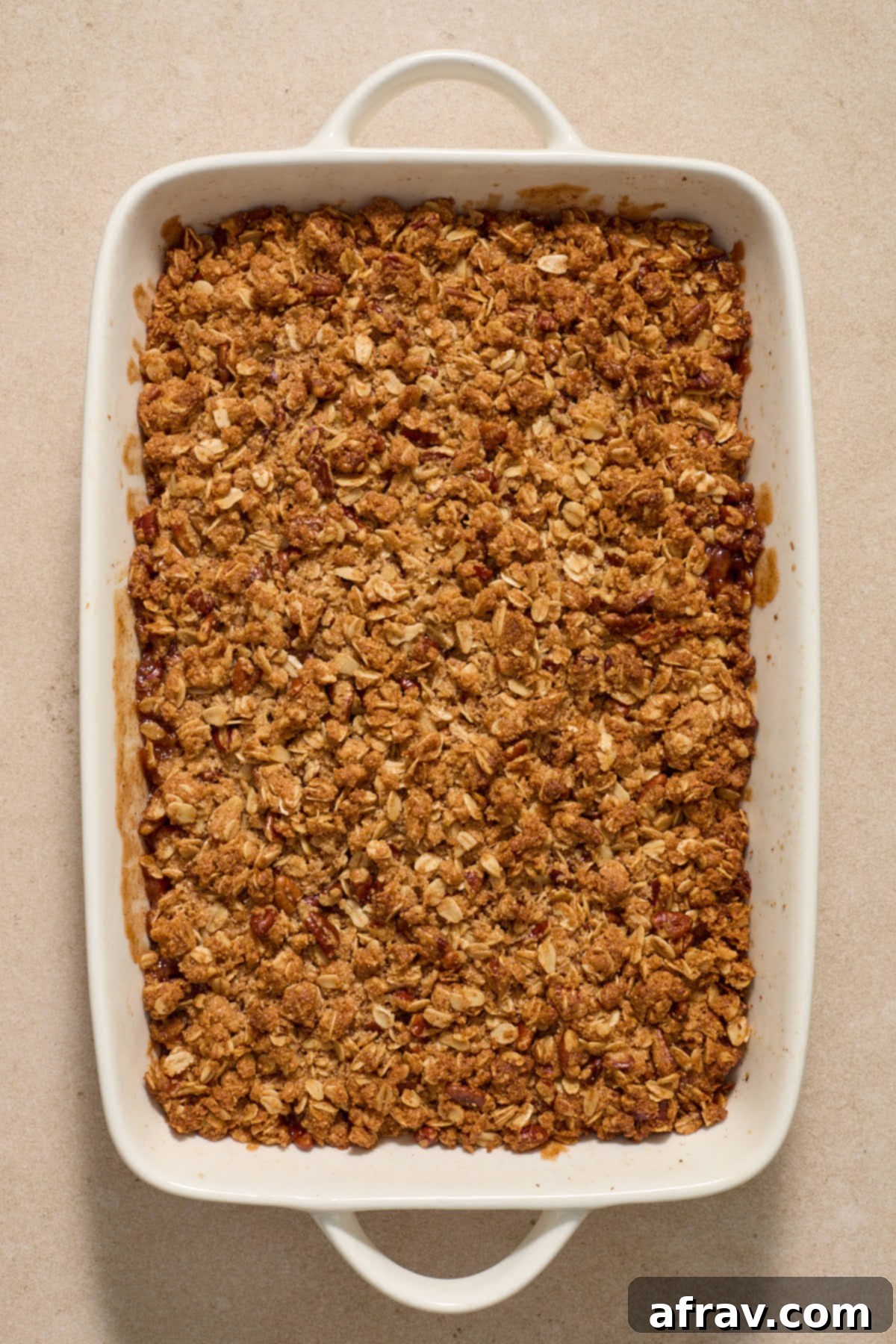Gluten-Free Almond Flour Apple Pecan Crisp 9 Baked crisp cooling in the dish, showing golden brown topping and bubbling filling.