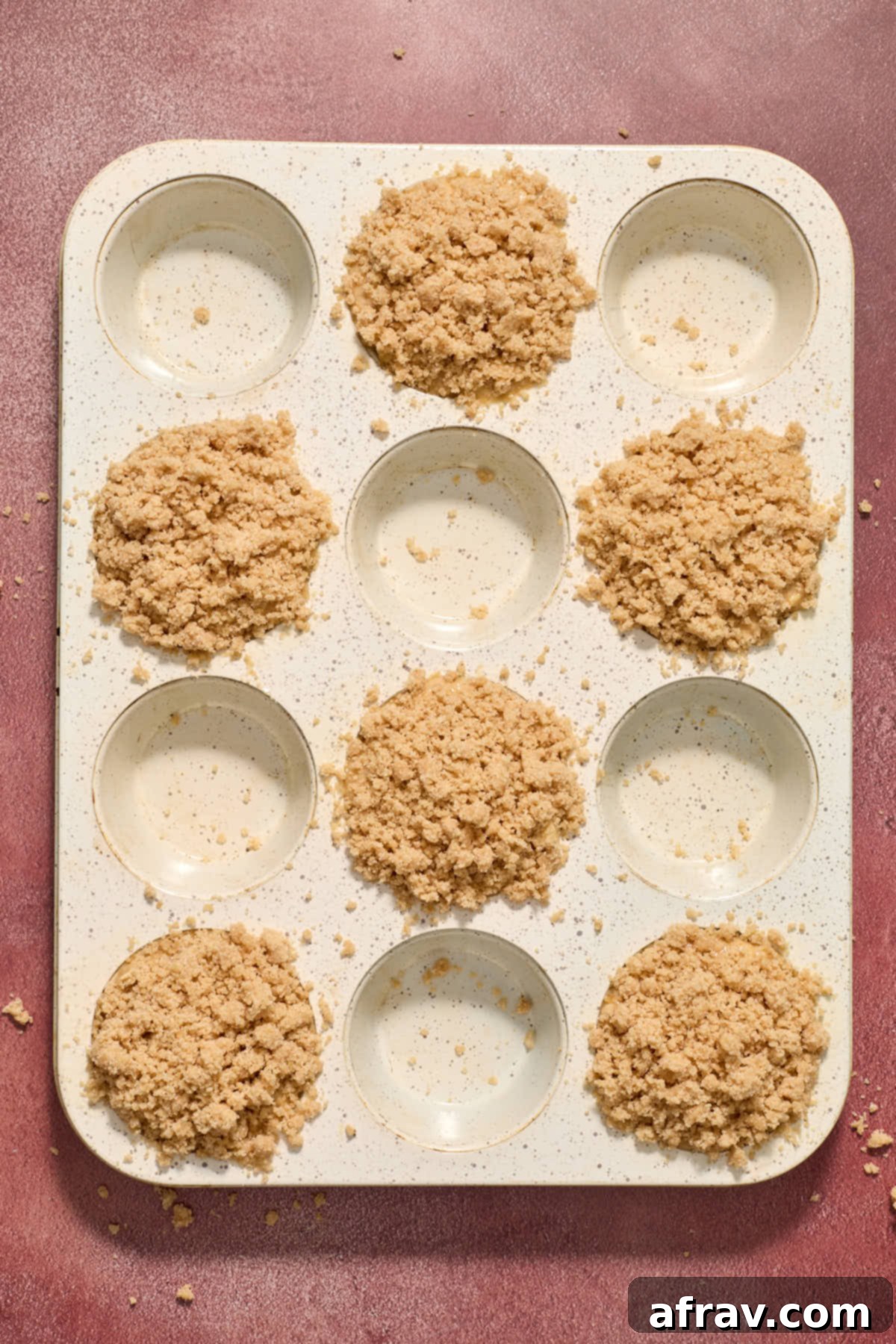 Streusel topping added to the muffins before baking.