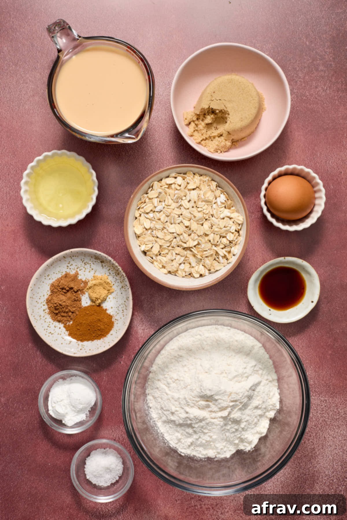 Ingredients to make eggnog muffins in individual dishes.
