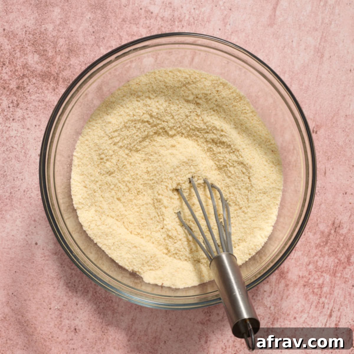 Almond Dream Bars: Chewy, Creamy, and Irresistibly Good 4 Dry ingredients whisked together in a glass bowl.