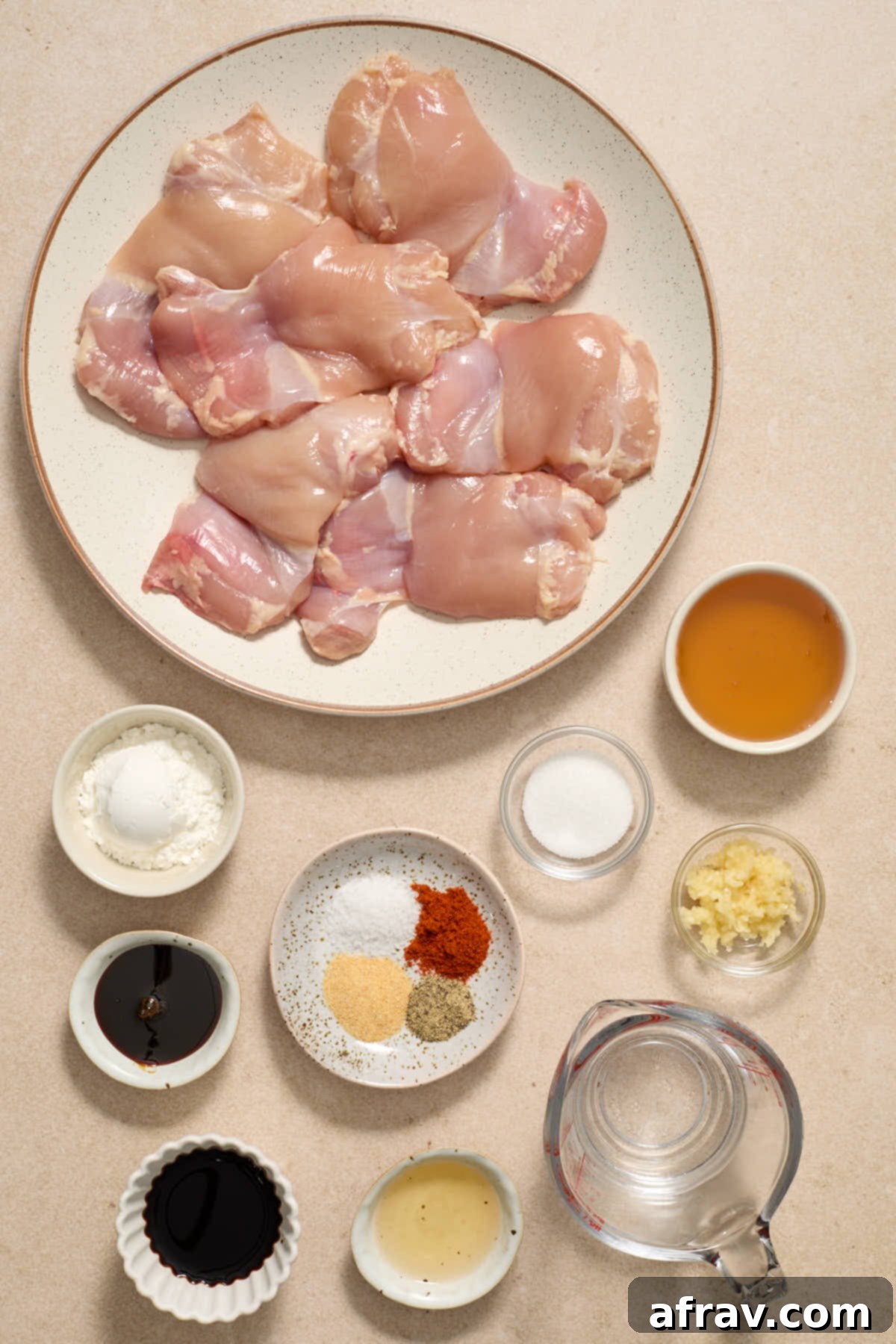 Honey Garlic Glazed Chicken Thighs: An Air Fryer Delight 3 Ingredients laid out for making air fryer boneless chicken thighs and honey garlic sauce.