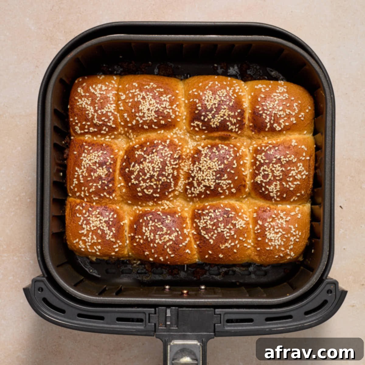 Air Fryer Mini Cheeseburgers 11 Air fried sliders fully cooked in the air fryer basket.